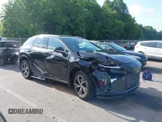 ✅ 2023 Lexus RX 350h • VIN: 2T2BBMCAXPC013056 • Lot: 42503203. Listed on IAAI with 52,018 mi. Free auction sales archive from the USA and detailed vehicle history report at DreamBid. Image 1.