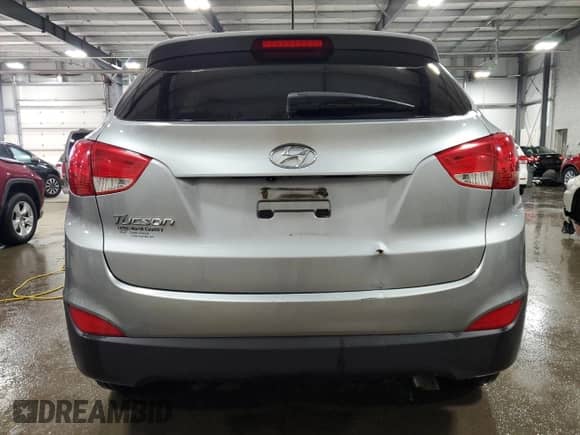 2015 Hyundai Tucson SE with VIN KM8JU3AG7FU083574, listed as a Copart auction lot 49579954 with 138,189 mi miles and Salvage title. Bid and sale history available at DreamBid. Image 6.