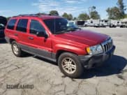 ✅ 2003 Jeep Grand Cherokee Laredo • VIN: 1J4GX48S83C514411 • Lot: 86515495. Listed on Copart with 115,099 mi. Free auction sales archive from the USA and detailed vehicle history report at DreamBid. Image 4.
