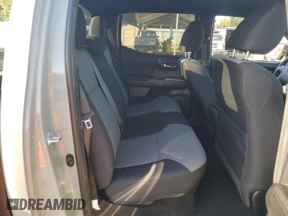 ✅ 2023 Toyota Tacoma SR • VIN: 3TMCZ5AN2PM564332 • Lot: 56237625. Listed on Copart with 82,789 mi. Free auction sales archive from the USA and detailed vehicle history report at DreamBid. Image 10.