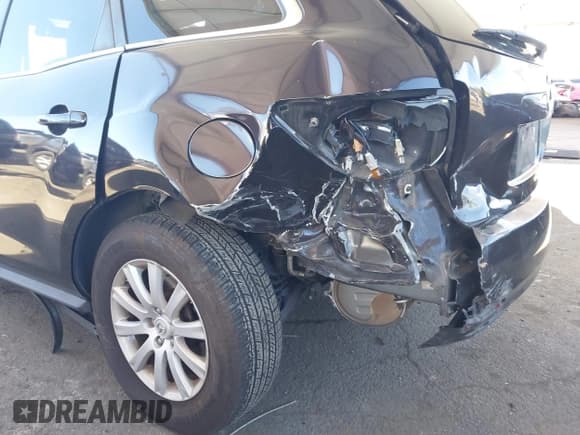 ✅ 2012 Mazda CX-7 i Touring • VIN: JM3ER2CMXC0421774 • Lot: 41743231. Wystawiony na IAAI z przebiegiem 132 488 mil. Bezpłatny archiwum sprzedaży aukcyjnych z USA i szczegółowy raport historii pojazdu na DreamBid. Zdjęcie 12.