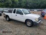 ✅ 1999 Toyota Tacoma • VIN: 4TAVL52N3XZ523937 • Lot: 66933295. Listed on Copart with 284,029 mi. Free auction sales archive from the USA and detailed vehicle history report at DreamBid. Image 4.