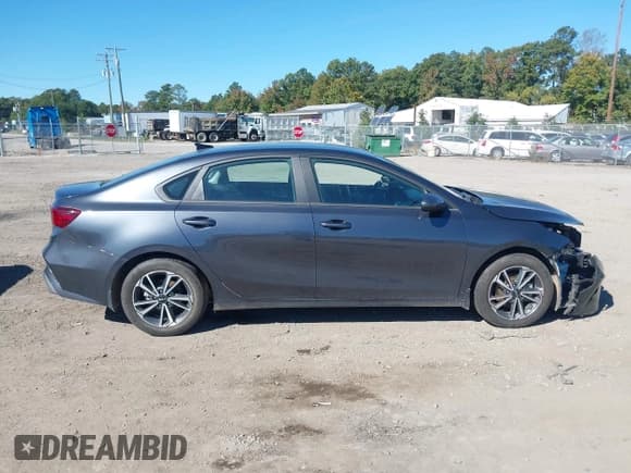 ✅ 2023 Kia Forte LXS • VIN: 3KPF24AD2PE608262 • Lot: 43429969. Listed on IAAI with 53,919 mi. Free auction sales archive from the USA and detailed vehicle history report at DreamBid. Image 14.