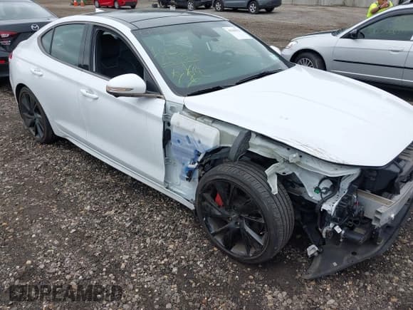 ✅ 2023 Genesis G70 3.3T • VIN: KMTG54TE9PU119572 • Lot: 42708374. Listed on IAAI with 14,513 mi. Free auction sales archive from the USA and detailed vehicle history report at DreamBid. Image 1.