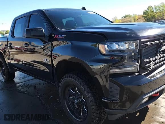 ✅ 2020 Chevrolet Silverado 1500 RST • VIN: 3GCUYEED7LG114208 • Lot: 85761795. Listed on Copart with 84,666 mi. Free auction sales archive from the USA and detailed vehicle history report at DreamBid. Image 14.