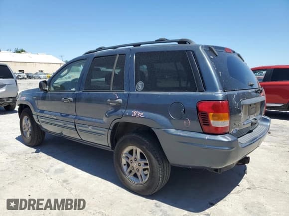 ✅ 2004 Jeep Grand Cherokee Laredo • VIN: 1J4GX48N54C371073 • Лот: 52202855. Опубликован ранее на Copart с пробегом 212 368 миль. Бесплатный доступ к архиву аукционных продаж из США и подробный отчёт об истории автомобиля на DreamBid. Изображение 2.