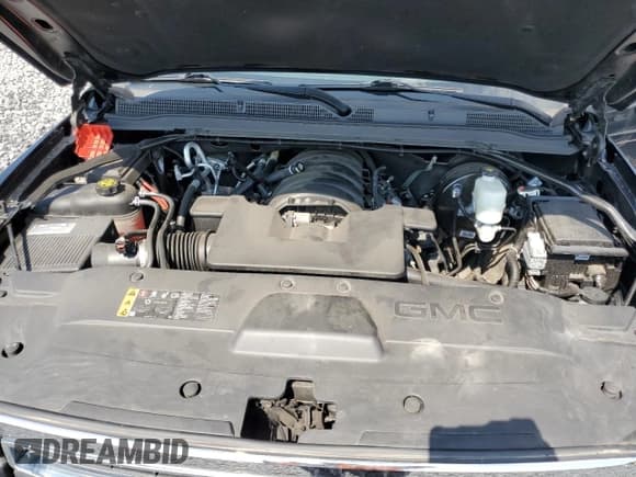 ✅ 2019 GMC Yukon XL SLT • VIN: 1GKS1GKC7KR262185 • Lot: 65126985. Listed on Copart with 89,046 mi. Free auction sales archive from the USA and detailed vehicle history report at DreamBid. Image 12.