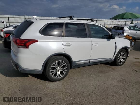 2017 Mitsubishi Outlander ES with VIN JA4AD2A31HZ002029, listed as a Copart auction lot 84197975 with 154,069 mi miles and Salvage title. Bid and sale history available at DreamBid. Image 3.