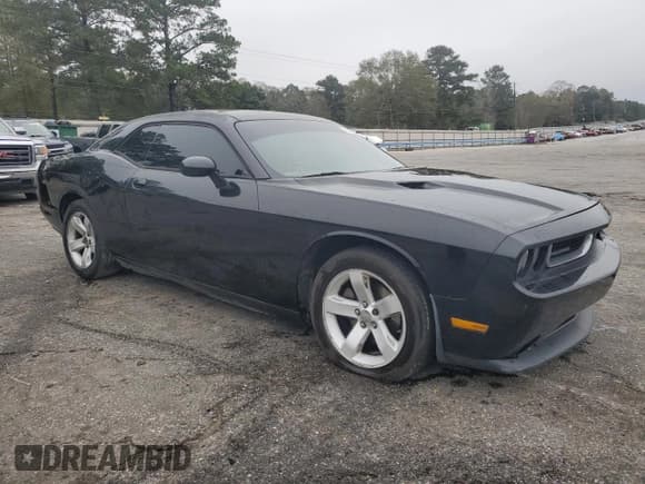 ✅ 2012 Dodge Challenger SXT • VIN: 2C3CDYAG1CH291592 • Lot: 86270304. Wystawiony na Copart z przebiegiem 231 594 mil. Bezpłatny archiwum sprzedaży aukcyjnych z USA i szczegółowy raport historii pojazdu na DreamBid. Zdjęcie 4.