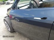 ✅ 2023 Tesla Model Y Long Range • VIN: 7SAYGDEE1PA166355 • Lot: 42162227. Listed on IAAI with 11,040 mi. Free auction sales archive from the USA and detailed vehicle history report at DreamBid. Image 6.