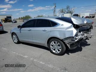 ✅ 2018 Chevrolet Impala LT • VIN: 1G1105S3XJU148359 • Лот: 71854994. Опубликован ранее на Copart с пробегом 100 789 миль. Бесплатный доступ к архиву аукционных продаж из США и подробный отчёт об истории автомобиля на DreamBid. Изображение 2.