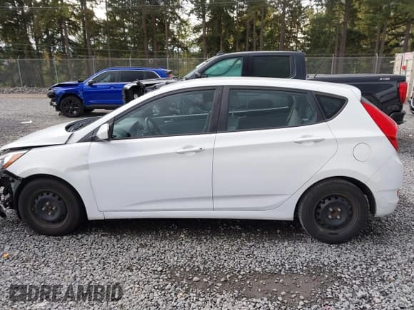 ✅ 2017 Hyundai Accent SE • VIN: KMHCT5AE0HU324058 • Lot: 43421624. Listed on IAAI with 87,466 mi. Free auction sales archive from the USA and detailed vehicle history report at DreamBid. Image 14.