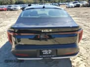 ✅ 2025 Kia K4 LXS • VIN: 3KPFT4DE2SE182986 • Лот: 86995875. Опубликован ранее на Copart с пробегом 700 миль. Бесплатный доступ к архиву аукционных продаж из США и подробный отчёт об истории автомобиля на DreamBid. Изображение 6.