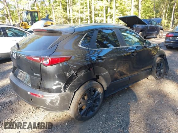 ✅ 2024 Mazda CX-30 S Select Sport • VIN: 3MVDMBBMXRM690897 • Lot: 43474749. Listed on IAAI with 33,878 mi. Free auction sales archive from the USA and detailed vehicle history report at DreamBid. Image 4.