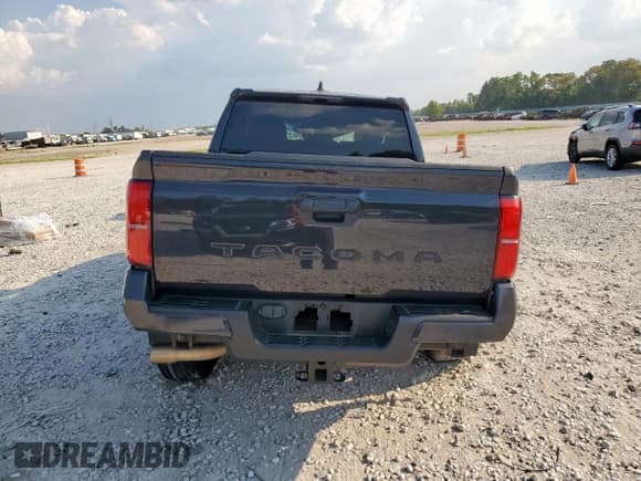 ✅ 2024 Toyota Tacoma SR5 • VIN: 3TMKB5FNXRM004585 • Lot: 80822375. Listed on Copart with 42,846 mi. Free auction sales archive from the USA and detailed vehicle history report at DreamBid. Image 6.