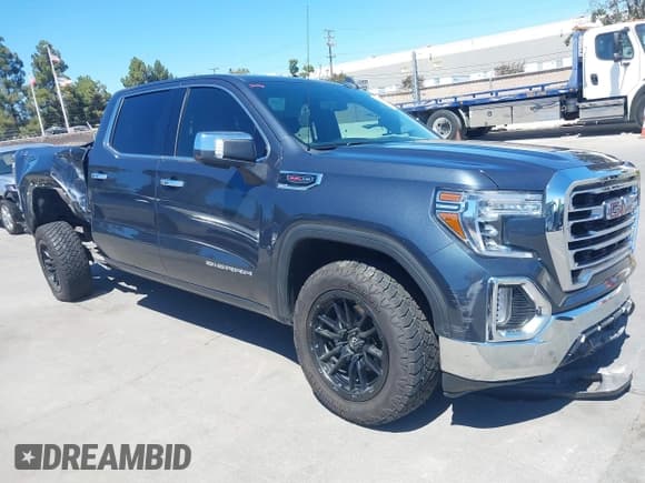 ✅ 2022 GMC Sierra 1500 SLT • VIN: 1GTU9DELONZ219903 • Lot: 40140320. Listed on IAAI with 57,019 mi. Free auction sales archive from the USA and detailed vehicle history report at DreamBid. Image 1.