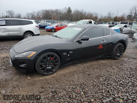 ✅ 2009 Maserati GranTurismo • VIN: ZAMGJ45A990044267 • Lot: 84144674. Listed on Copart with 63,178 mi. Free auction sales archive from the USA and detailed vehicle history report at DreamBid. Image 1.