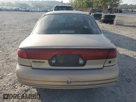 ✅ 1998 Ford Contour LX • VIN: 1FALP6531WK143251 • Lot: 82002575. Wystawiony na Copart z przebiegiem 112 110 mil. Bezpłatny archiwum sprzedaży aukcyjnych z USA i szczegółowy raport historii pojazdu na DreamBid. Zdjęcie 6.