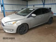 ✅ 2015 Ford Focus Titanium • VIN: 1FADP3N27FL210598 • Lot: 61410955. Listed on Copart with 126,394 mi. Free auction sales archive from the USA and detailed vehicle history report at DreamBid. Image 1.
