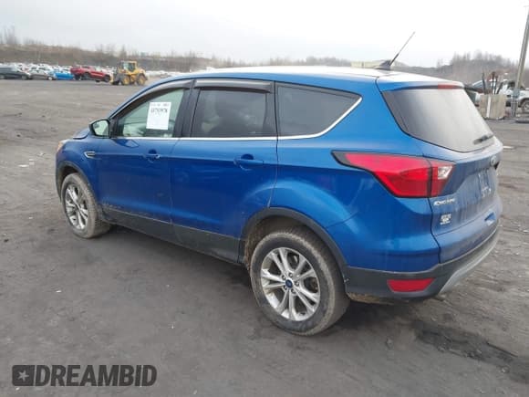 ✅ 2019 Ford Escape SE • VIN: 1FMCU9GD8KUA34936 • Lot: 43753978. Listed on IAAI with 96,200 mi. Free auction sales archive from the USA and detailed vehicle history report at DreamBid. Image 3.