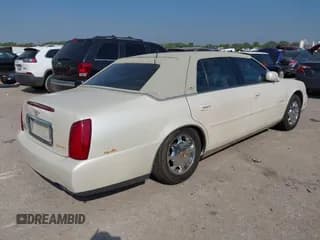 ✅ 2003 Cadillac DeVille • VIN: 1G6KD54Y43U210692 • Lot: 43233729. Listed on IAAI with 98,728 mi. Free auction sales archive from the USA and detailed vehicle history report at DreamBid. Image 4.