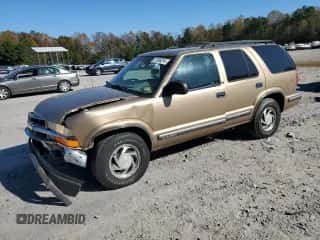 1999 Chevrolet Blazer LS with VIN 1GNDT13WXX2105262, listed as a Copart auction lot 77536214 with 155,108 mi miles and Salvage title. Bid and sale history available at DreamBid. Image 1.