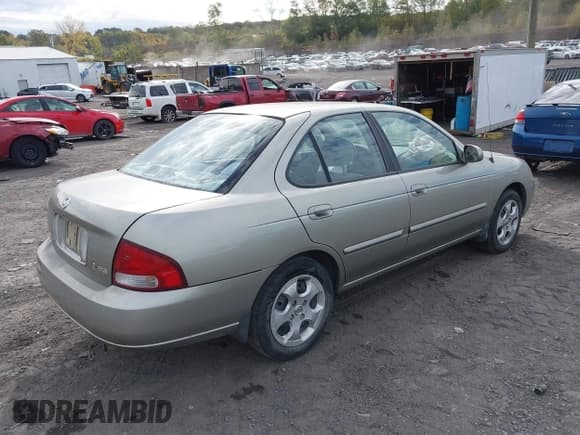 ✅ 2003 Nissan Sentra GXE • VIN: 3N1CB51D33L804907 • Lot: 43469910. Listed on IAAI with 67,005 mi. Free auction sales archive from the USA and detailed vehicle history report at DreamBid. Image 4.