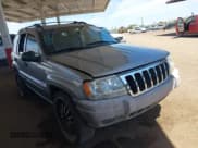 ✅ 2001 Jeep Grand Cherokee Laredo • VIN: 1J4GX48S21C648442 • Lot: 42023940. Listed on IAAI with 202,630 mi. Free auction sales archive from the USA and detailed vehicle history report at DreamBid. Image 1.