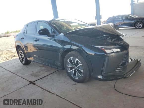 ✅ 2023 Lexus RZ 450e Premium • VIN: JTJAAAAB0PA015963 • Lot: 64261624. Listed on Copart with 14,913 mi. Free auction sales archive from the USA and detailed vehicle history report at DreamBid. Image 4.
