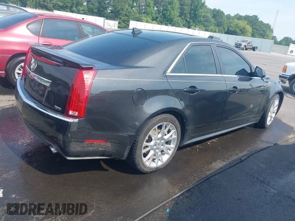 ✅ 2012 Cadillac CTS Premium • VIN: 1G6DS5E33C0108521 • Lot: 42599993. Listed on IAAI with 210,826 mi. Free auction sales archive from the USA and detailed vehicle history report at DreamBid. Image 4.