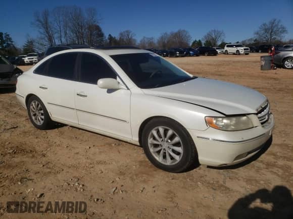 2006 Hyundai Azera SE z VIN KMHFC46F46A134061, wystawiony jako Copart lot #87227344 z przebiegiem 224 496 mil mil oraz Szkoda całkowita • Salvage title. Historia ofert i sprzedaży dostępna na DreamBid. Obrazek 4.