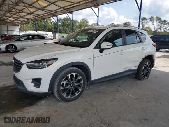 ✅ 2016 Mazda CX-5 Grand Touring • VIN: JM3KE2DY6G0899325 • Lot: 81476285. Listed on Copart with 95,293 mi. Free auction sales archive from the USA and detailed vehicle history report at DreamBid. Image 1.