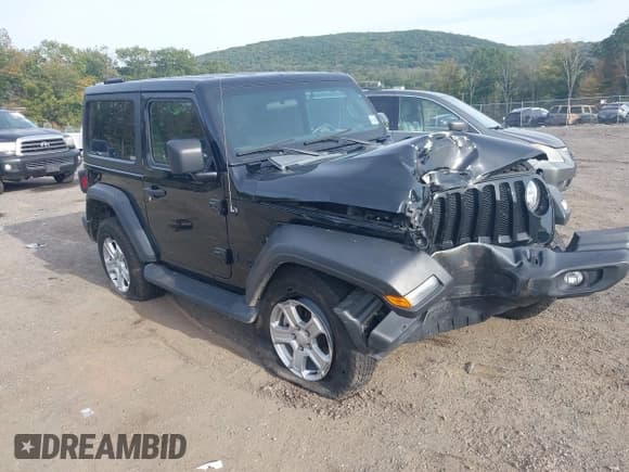 ✅ 2022 Jeep Wrangler Willys • VIN: 1C4GJXAN0NW152542 • Lot: 43302104. Listed on IAAI with 52,419 mi. Free auction sales archive from the USA and detailed vehicle history report at DreamBid. Image 1.
