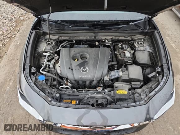 ✅ 2022 Mazda CX-30 S Preferred • VIN: 3MVDMBCL5NM422470 • Лот: 82083615. Опубликован ранее на Copart с пробегом 24 506 миль. Бесплатный доступ к архиву аукционных продаж из США и подробный отчёт об истории автомобиля на DreamBid. Изображение 12.