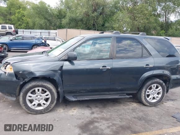 ✅ 2006 Acura MDX Touring • VIN: 2HNYD18896H537049 • Lot: 42735984. Listed on IAAI with 274,415 mi. Free auction sales archive from the USA and detailed vehicle history report at DreamBid. Image 14.