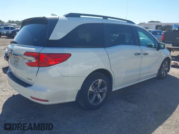 ✅ 2018 Honda Odyssey Touring • VIN: 5FNRL6H84JB027099 • Лот: 43503552. Опубликован ранее на IAAI с пробегом 108 710 миль. Бесплатный доступ к архиву аукционных продаж из США и подробный отчёт об истории автомобиля на DreamBid. Изображение 4.