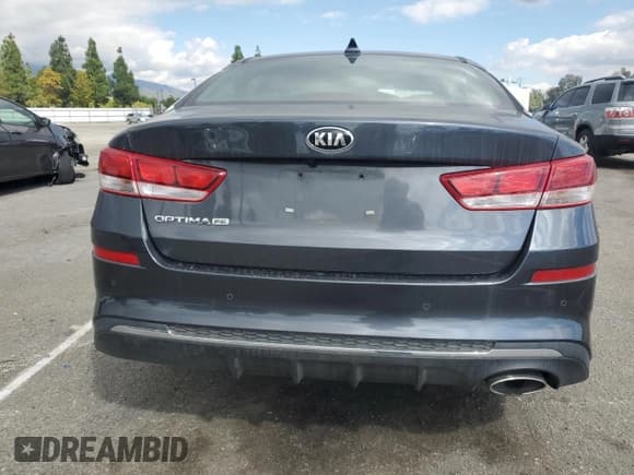 ✅ 2020 Kia Optima LX • VIN: 5XXGT4L36LG391581 • Лот: 82392805. Опубликован ранее на Copart с пробегом 67 640 миль. Бесплатный доступ к архиву аукционных продаж из США и подробный отчёт об истории автомобиля на DreamBid. Изображение 6.