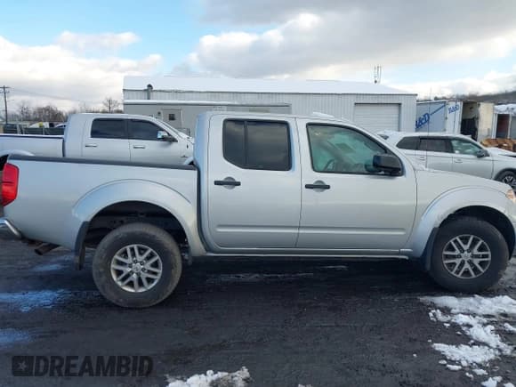 ✅ 2019 Nissan Frontier SL • VIN: 1N6AD0EV5KN733953 • Lot: 43826335. Listed on IAAI with 69,780 mi. Free auction sales archive from the USA and detailed vehicle history report at DreamBid. Image 13.