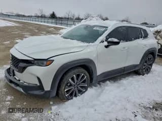 ✅ 2023 Mazda CX-50 Premium • VIN: 7MMVABDYXPN103700 • Lot: 94720055. Listed on Copart with 46,492 mi. Free auction sales archive from the USA and detailed vehicle history report at DreamBid. Image 1.