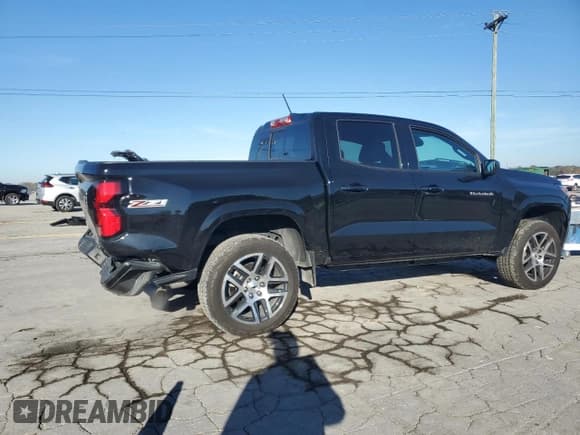 ✅ 2023 Chevrolet Colorado 4WD Z71 • VIN: 1GCPTDEK0P1219679 • Lot: 91065435. Listed on Copart with 9,982 mi. Free auction sales archive from the USA and detailed vehicle history report at DreamBid. Image 3.