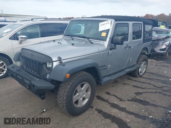 ✅ 2018 Jeep Wrangler Unlimited Sport • VIN: 1C4BJWDGXJL835930 • Lot: 43687476. Listed on IAAI with 40,017 mi. Free auction sales archive from the USA and detailed vehicle history report at DreamBid. Image 2.