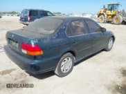 ✅ 1996 Honda Civic LX O • VIN: 2HGEJ667XTH545957 • Лот: 42866308. Опубликован ранее на IAAI с пробегом 217 969 миль. Бесплатный доступ к архиву аукционных продаж из США и подробный отчёт об истории автомобиля на DreamBid. Изображение 4.