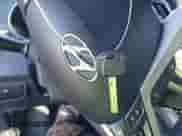 2013 Hyundai Veloster w/Black Int with VIN KMHTC6AD9DU093846, listed as a IAAI auction lot 43617895 with 179,710 mi miles and . Bid and sale history available at DreamBid. Image 11.