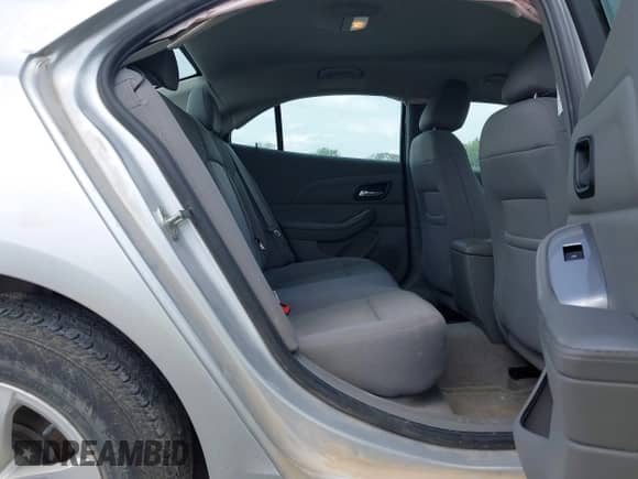 2014 Chevrolet Malibu LS z VIN 1G11A5SL9EF292864, wystawiony jako IAAI lot #42540657 z przebiegiem 119 962 mil mil oraz . Historia ofert i sprzedaży dostępna na DreamBid. Obrazek 8.