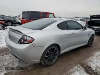 2008 Hyundai Tiburon GS z VIN KMHHM66D48U292160, wystawiony jako Copart lot #84760964 z przebiegiem 114 878 mil mil oraz Szkoda całkowita • Salvage title. Historia ofert i sprzedaży dostępna na DreamBid. Obrazek 3.