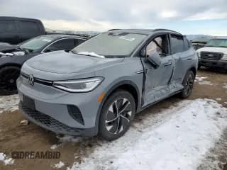 ✅ 2022 Volkswagen ID.4 Pro S • VIN: WVGGNPE26NP043996 • Лот: 40488003. Опубликован ранее на Copart с пробегом Не указан. Бесплатный доступ к архиву аукционных продаж из США и подробный отчёт об истории автомобиля на DreamBid. Изображение 1.