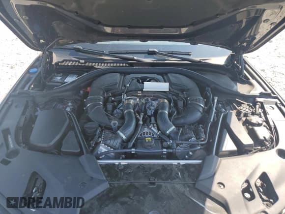 ✅ 2018 BMW 5 Series M550i xDrive • VIN: WBAJB9C55JB035565 • Лот: 69089415. Опубликован ранее на Copart с пробегом 48 913 миль. Бесплатный доступ к архиву аукционных продаж из США и подробный отчёт об истории автомобиля на DreamBid. Изображение 11.