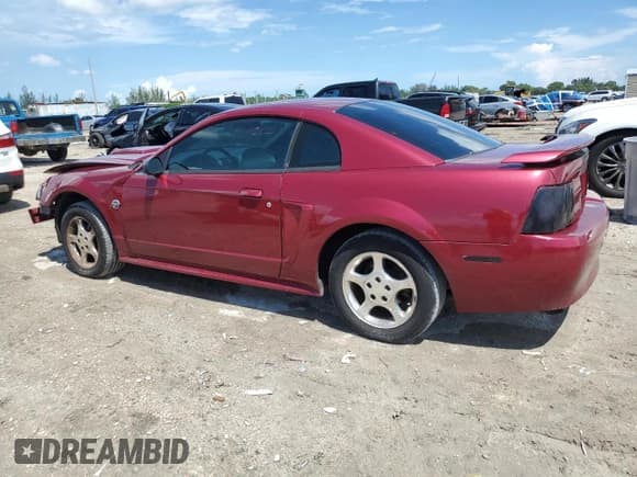 ✅ 2004 Ford Mustang Standard • VIN: 1FAFP40454F104086 • Lot: 80885815. Listed on Copart with 130,176 mi. Free auction sales archive from the USA and detailed vehicle history report at DreamBid. Image 2.