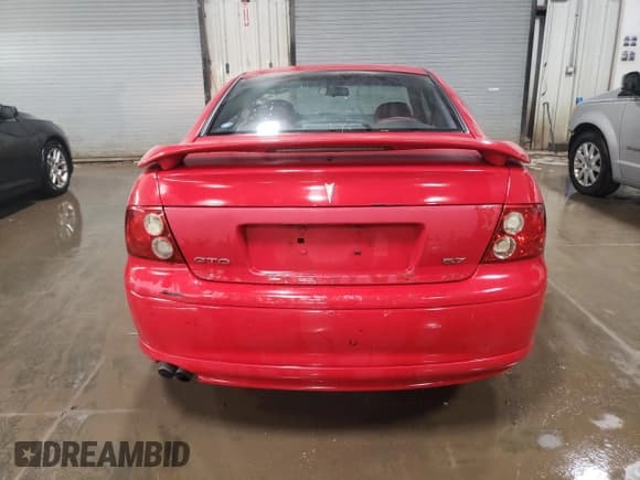 ✅ 2004 Pontiac GTO • VIN: 6G2VX12G74L288788 • Lot: 82424544. Listed on Copart with 212,085 mi. Free auction sales archive from the USA and detailed vehicle history report at DreamBid. Image 6.