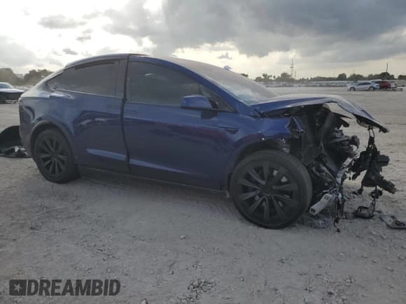 ✅ 2023 Tesla Model X • VIN: 7SAXCBE52PF384559 • Lot: 91859835. Wystawiony na Copart z przebiegiem 24 394 mil. Bezpłatny archiwum sprzedaży aukcyjnych z USA i szczegółowy raport historii pojazdu na DreamBid. Zdjęcie 4.